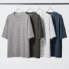 Unisex AIRism bomulls-T-shirt i oversized-modell med ränder Unisex AIRism bomulls-T-shirt i oversized-modell med ränder