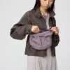 Unisex packbar crossbody-väska med fickor