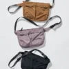 Unisex packbar crossbody-väska med fickor
