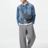 Unisex rund mini-axelväskor
